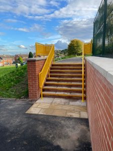 Stairs with yellow bespoke balustrading
