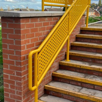 Stairs with yellow bespoke balustrade